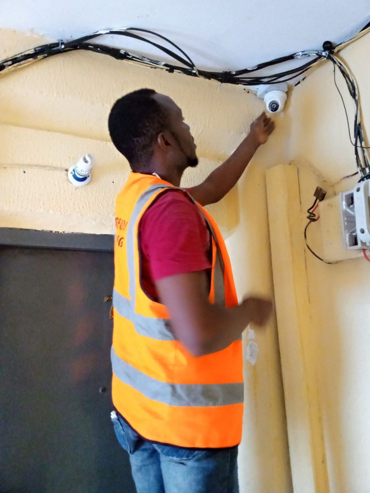 Bytecraft technician installing a dome CCTV camera